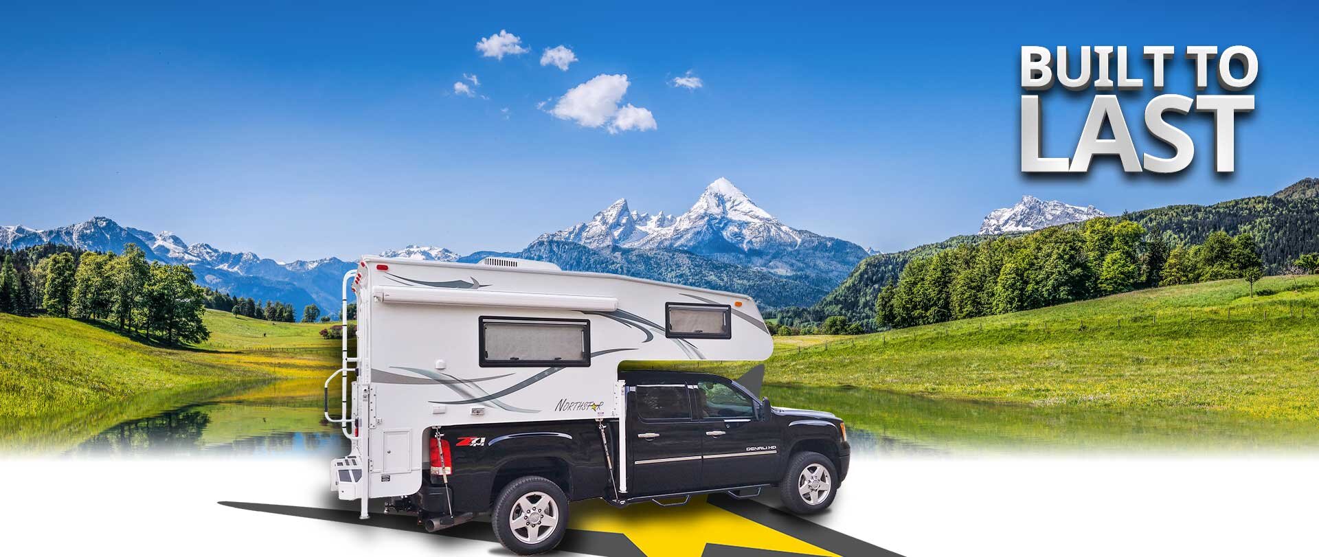 Black truck with camper in front of grassy plains with mountain in the background and the text Built To Last overlayed.